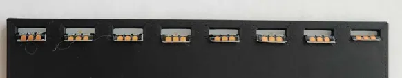 A black rectangular object with a black rectangular object with a black rectangular object with a black rectangular object with a black rectangular object with a black rectangular object with a black rectangular object with a black rectangular objectDescription automatically generated