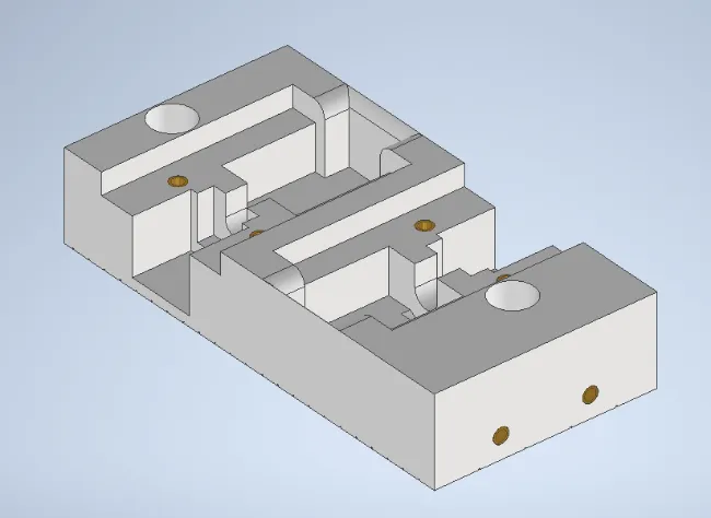 A white rectangular object with holesDescription automatically generated