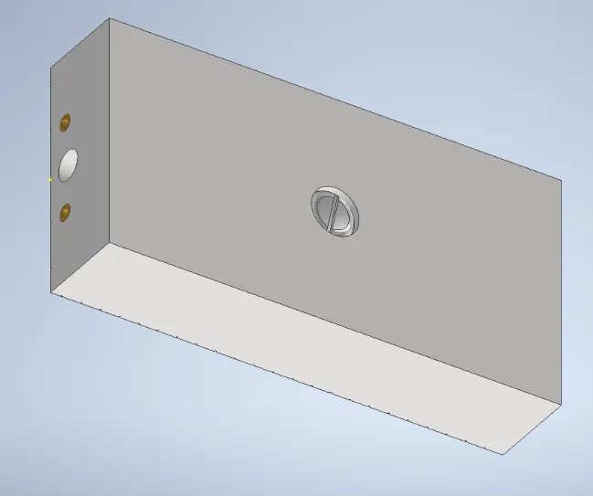 A grey rectangular object with a hole in the middleDescription automatically generated