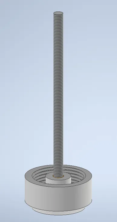A metal rod with a round base with San Jacinto Monument in the backgroundDescription automatically generated with medium confidence