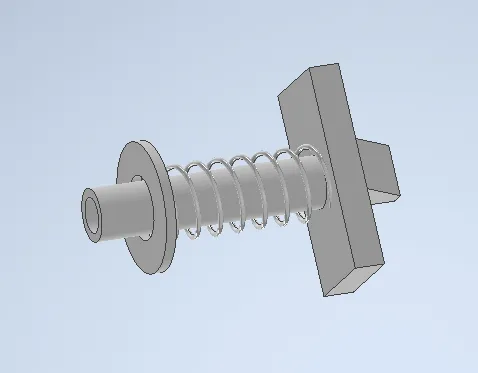 A metal spring and nutDescription automatically generated with medium confidence