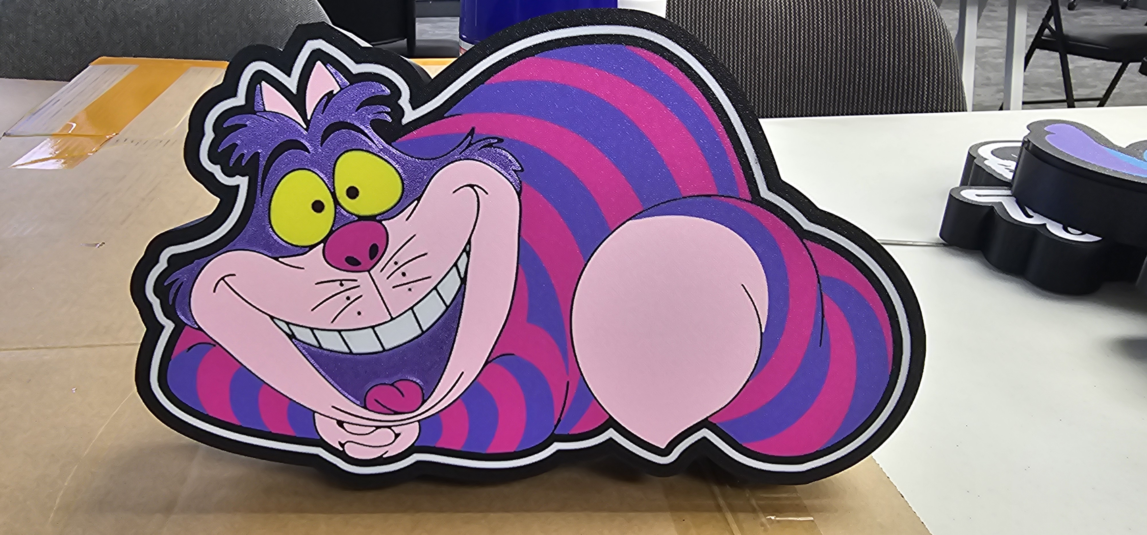 Gato de Cheshire de Alicia en el País de las Maravillas - Modelo