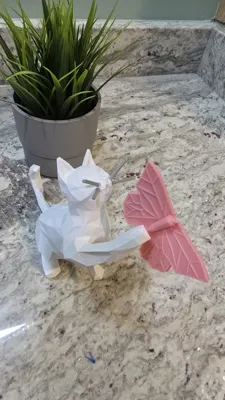 Playful Cat with Butterfly Sculpture - Free 3D Print Model - MakerWorld