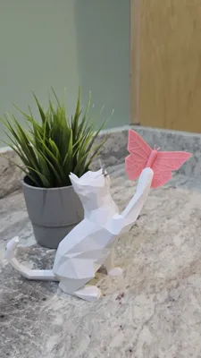 Playful Cat with Butterfly Sculpture - Free 3D Print Model - MakerWorld