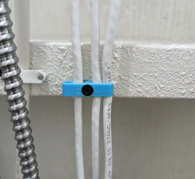 ETHERNET CABLE RUNNERS WITH A ZIP TIE AND SCREW HOLE