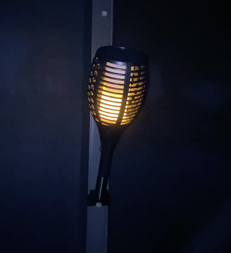 Torch holder for pool cages