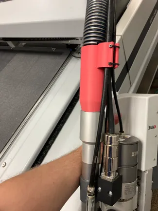 Zund router vacuum hose with cable holder