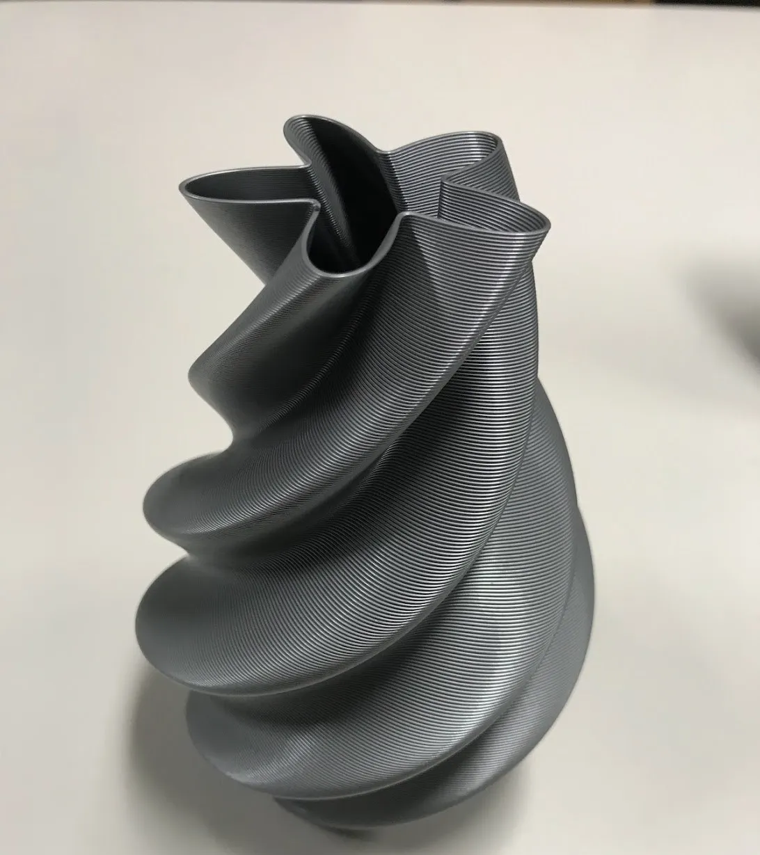 Vase fleur en spirale