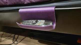 Bed side remote caddy