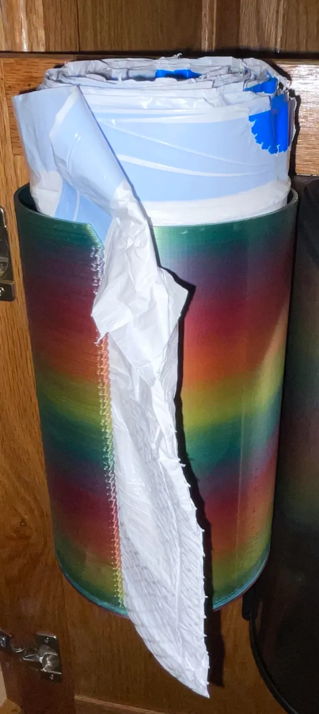 Trash bag roll dispenser