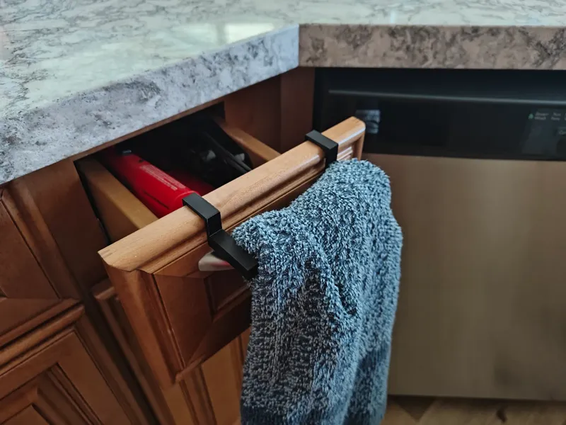 Kitchen towel holder with mounting holes