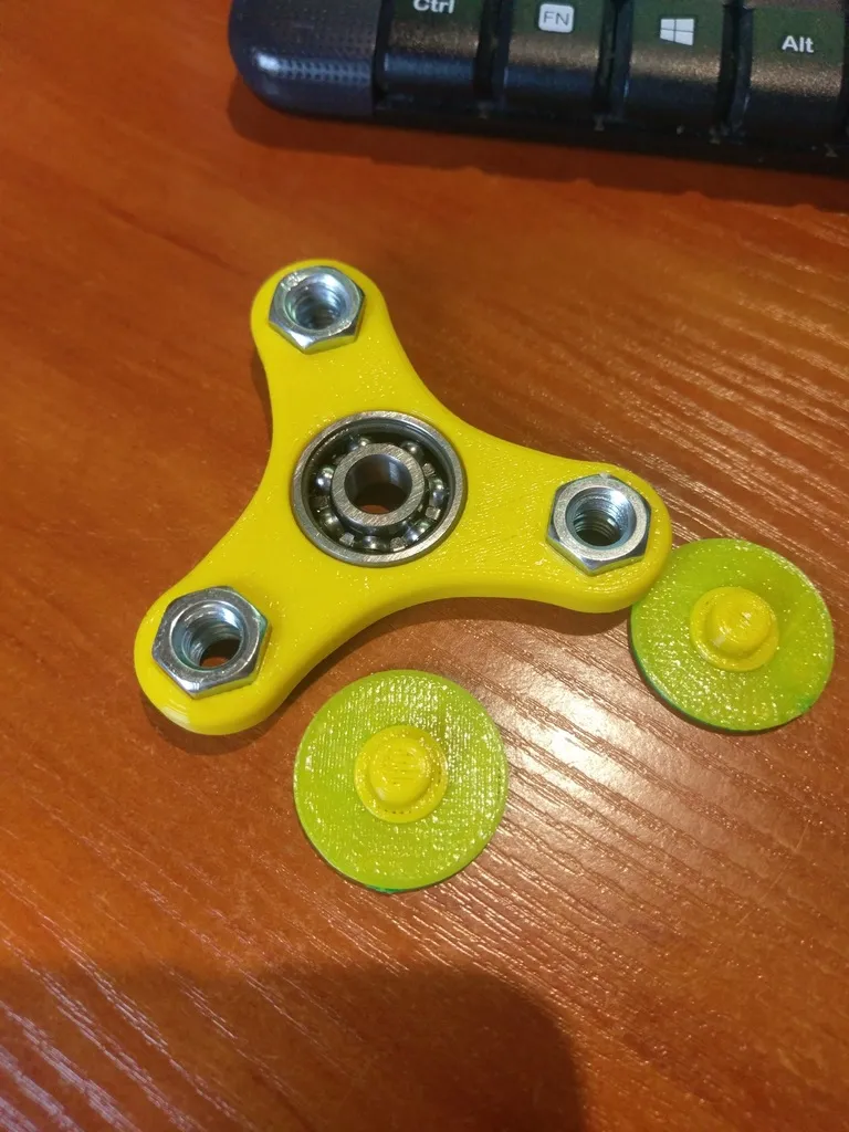 Fidget spinner with 628 bearing and 3 or 6 M8 nuts with grip 