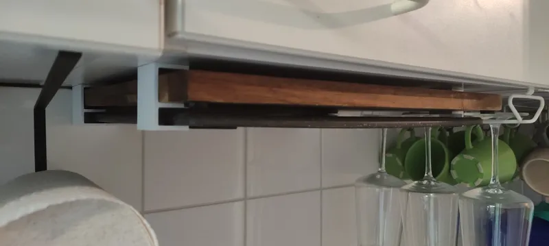 Under cabinet cutting board brackets
