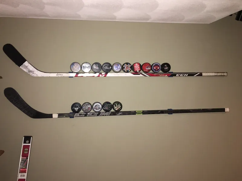 Hockey stick wall mount