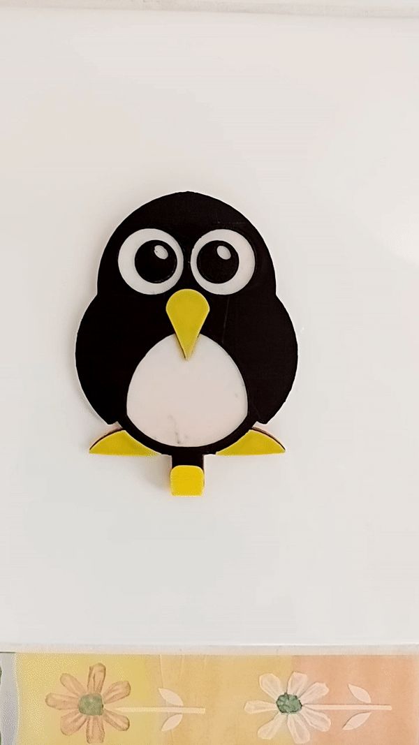 Penguin towel hanger
