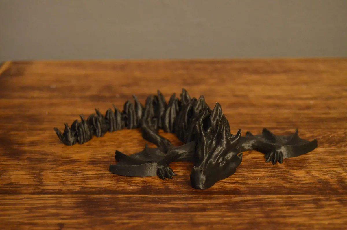 Articulated fire dragon - Free 3D Print Model - MakerWorld