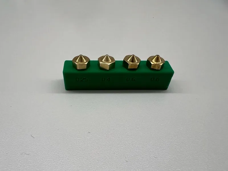 Nozzle holder with thread and description for 4 nozzles