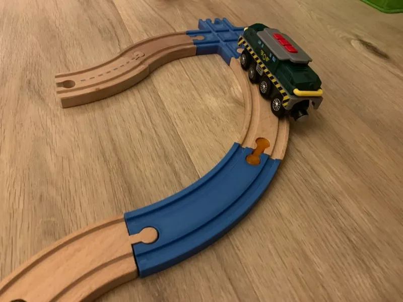 Turn rail for wooden trains and rails