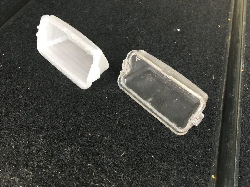 Peugeot/Citroen licenseplate bulb cover