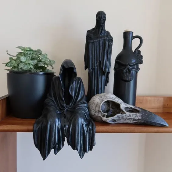 A STATUE OF A SITTING GHOST