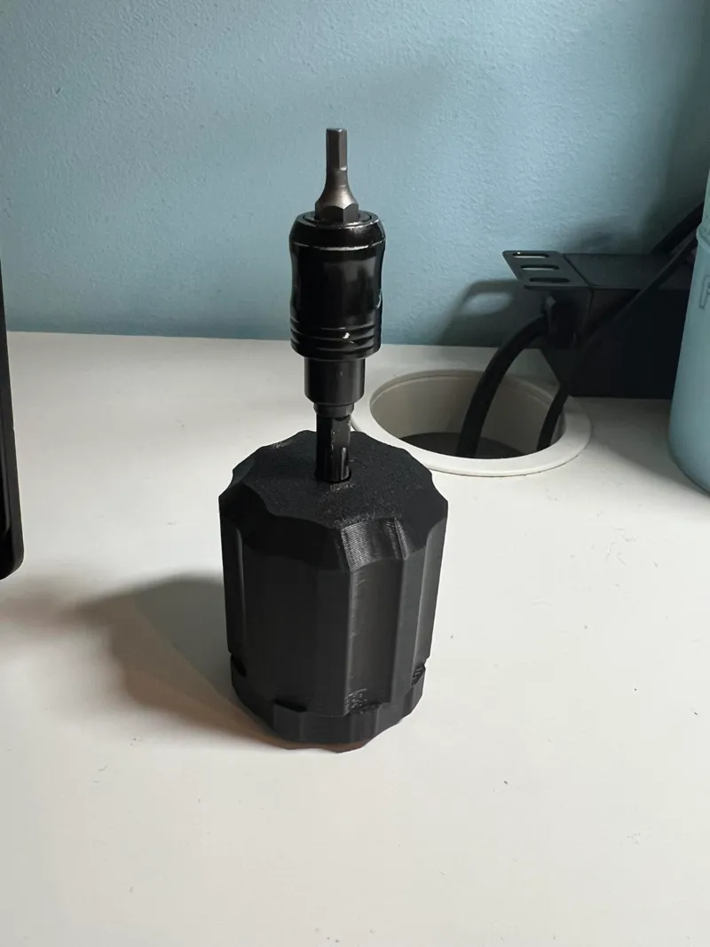 Screwdriver with compartment for 6 1/4" bits 
