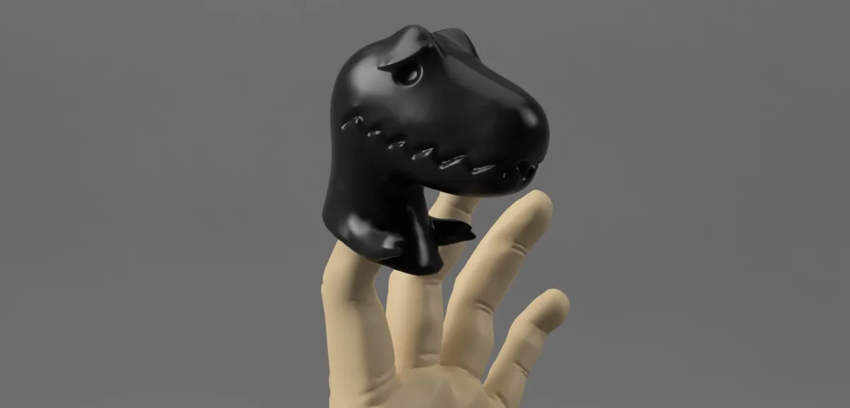 Marionnette à doigt T-rex qui applaudit