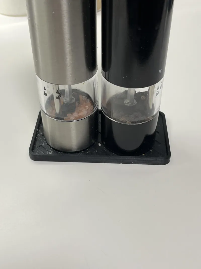 Plate under salt and pepper dispensers