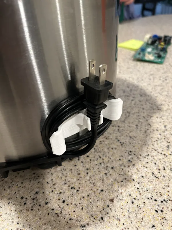 Cord Wrap, plug holder, curved or flat surface