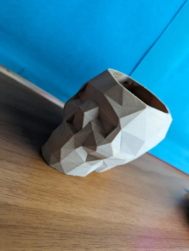 low-poly skull pen holder