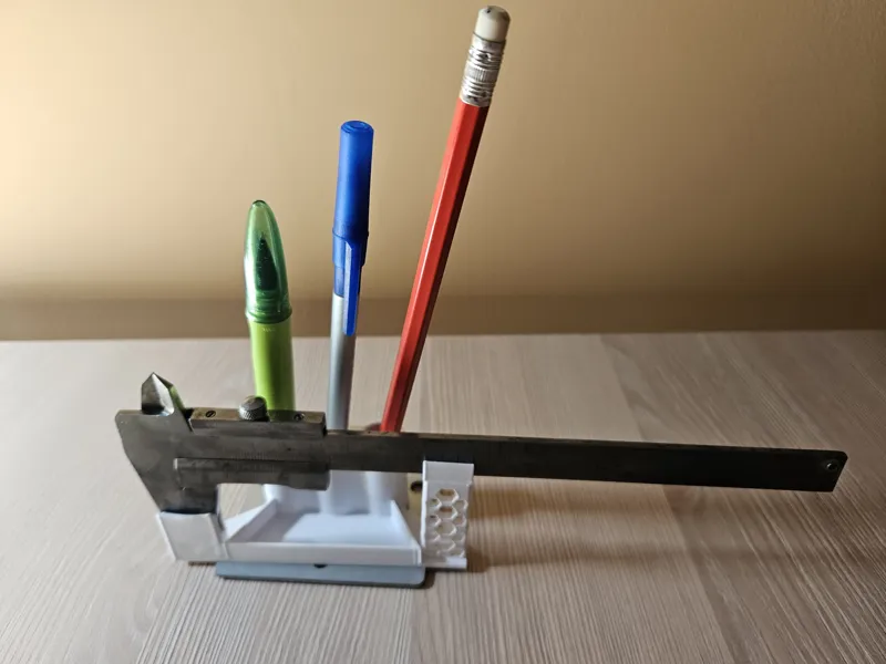 Pens and caliper holder