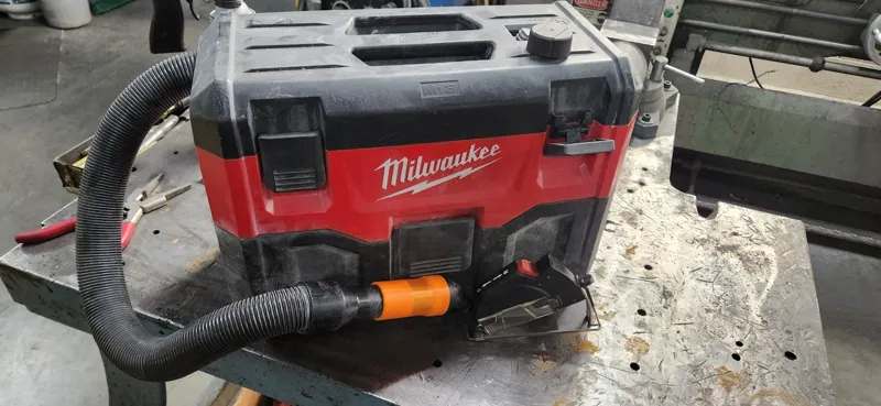 Cutoff tool vacuum adapter