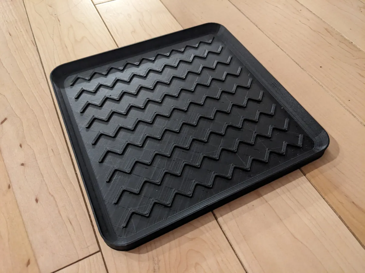 Petit tapis / bac récupérateur pour chaussures