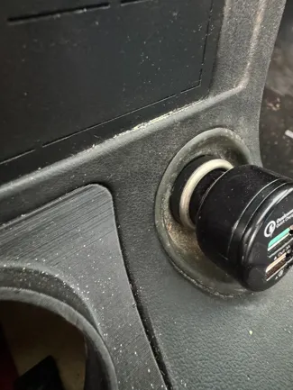 Cigarette outlet surround