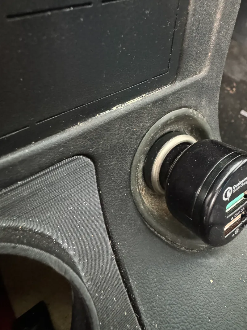 Cigarette outlet surround