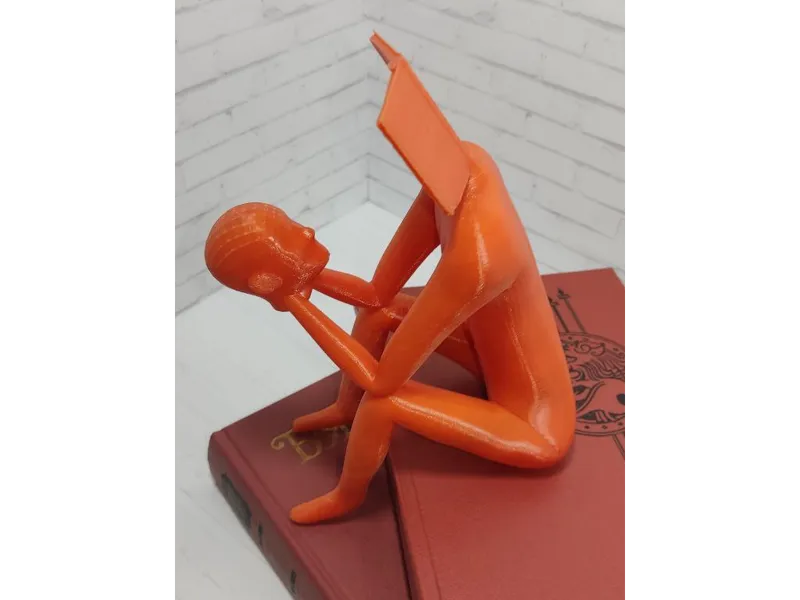 Book Reads Man, Statuette