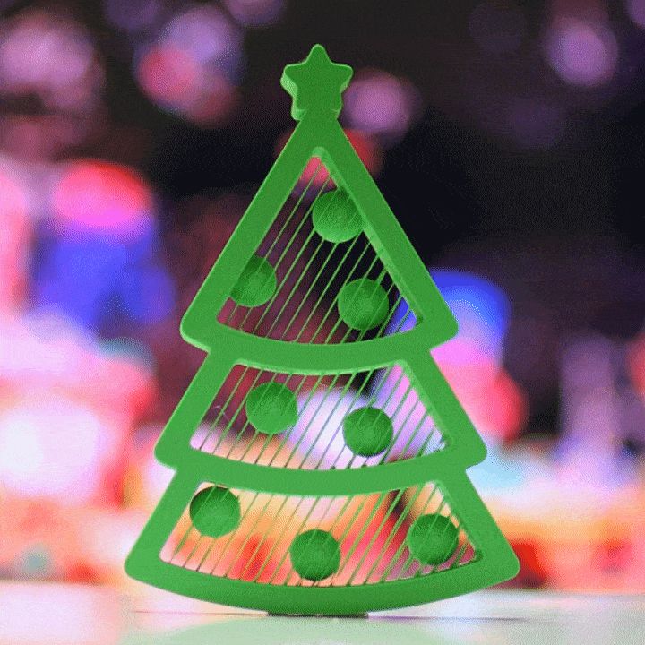 CHRISTMAS TREE WITH SUSPENDED ORNAMENTS