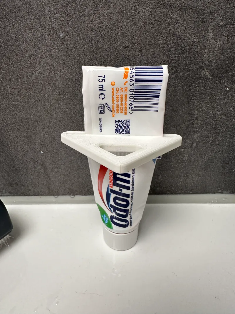 Toothpaste squeezer