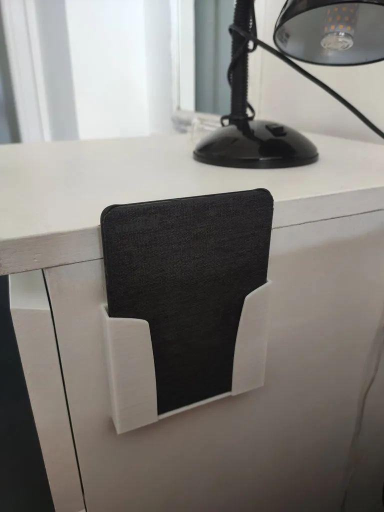 Wall mounted Kindle holder