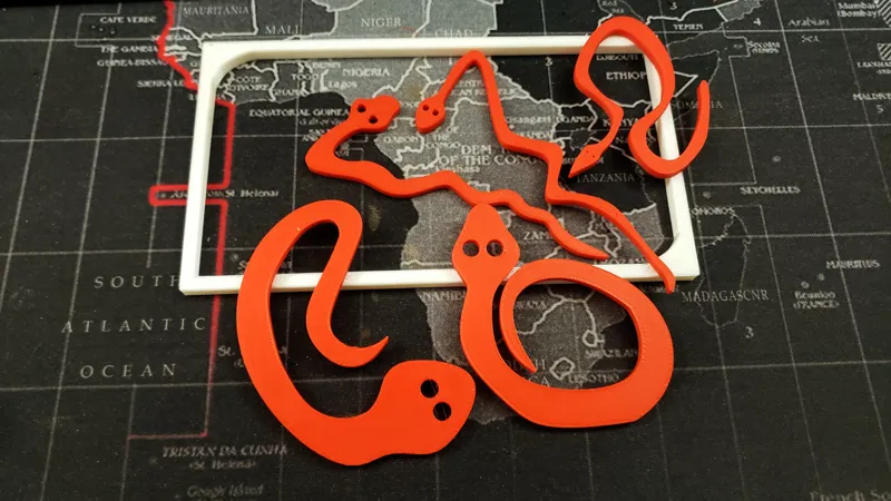 Five Snakes - can you fit them? Packing puzzle.