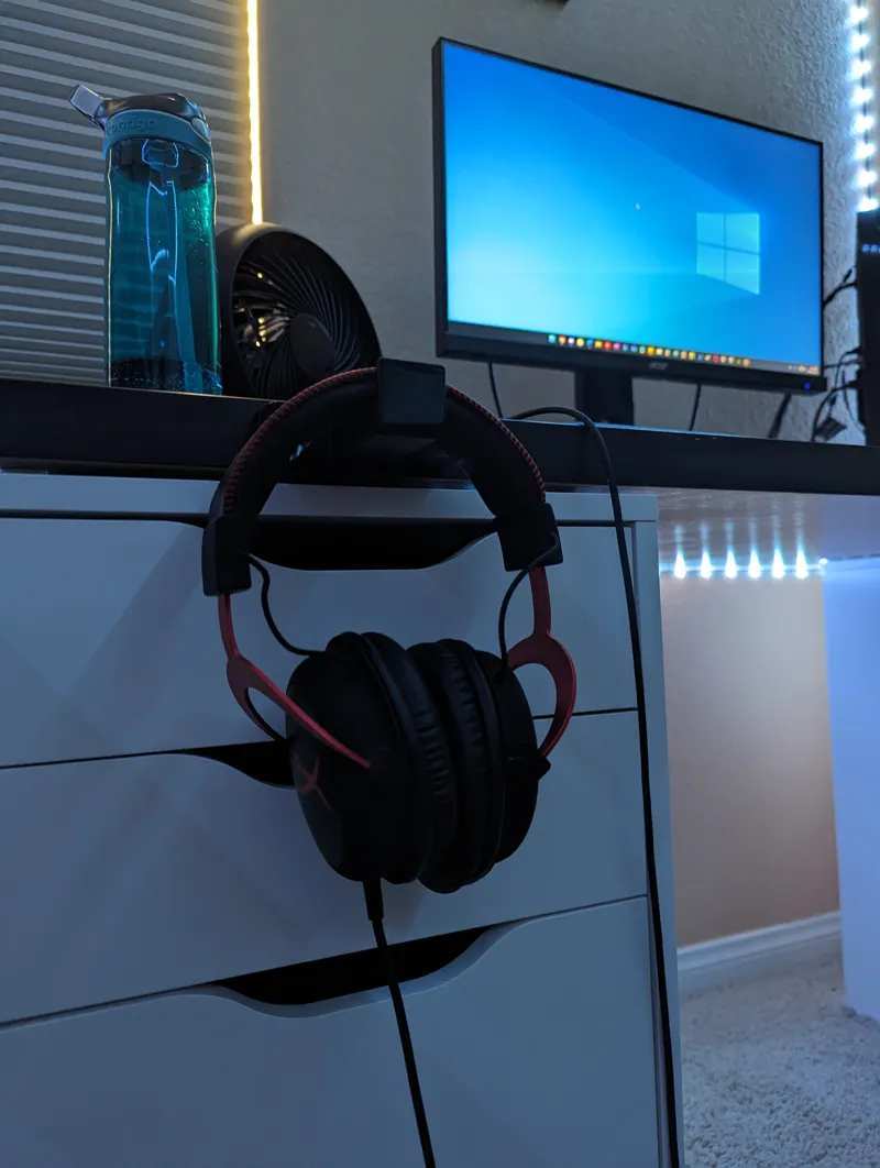 Headphone holder with command strip