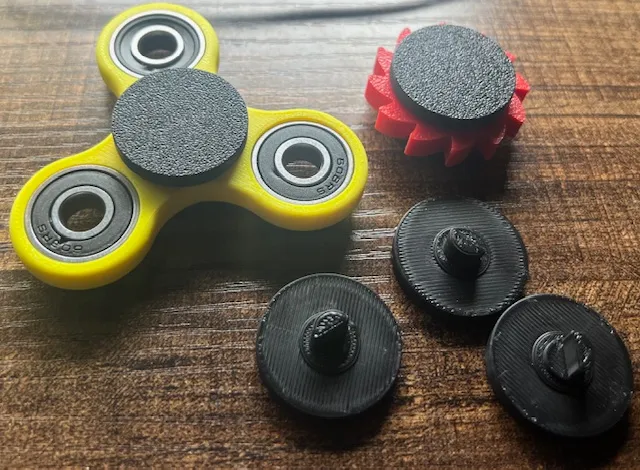 idnarbjm's Fidget spinner caps.