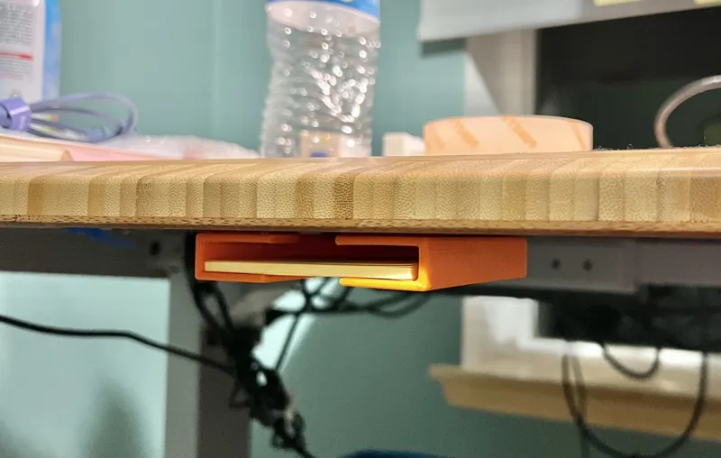 Under desk post-it holder