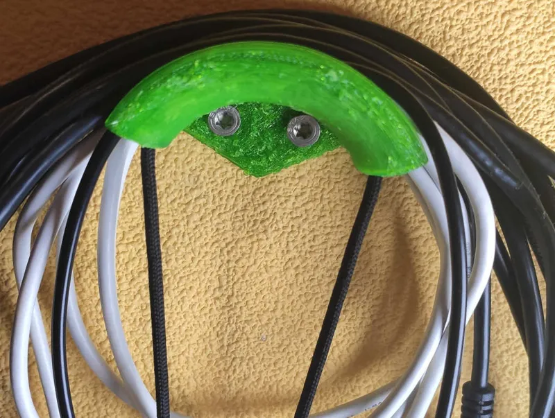 Wall cable holder