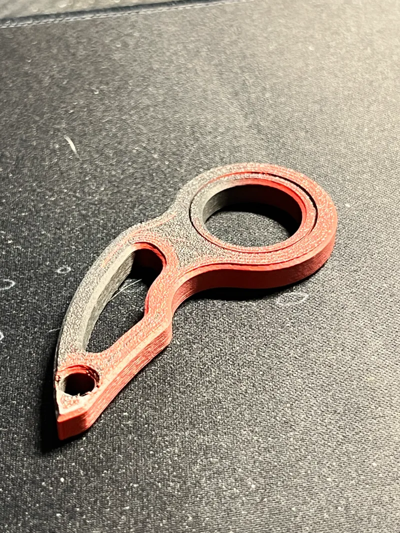 Balisong keychain with bushing