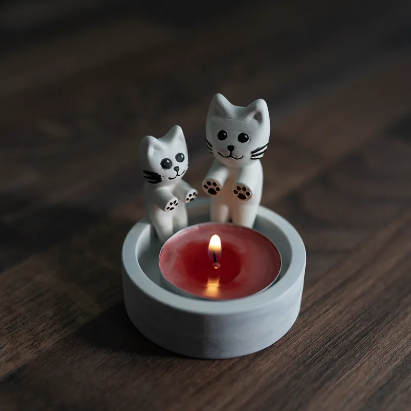 Cat candle warming paws