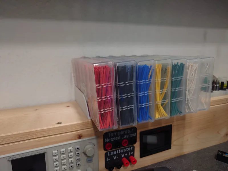 Assortment box holder (e.g. shrink tubing)