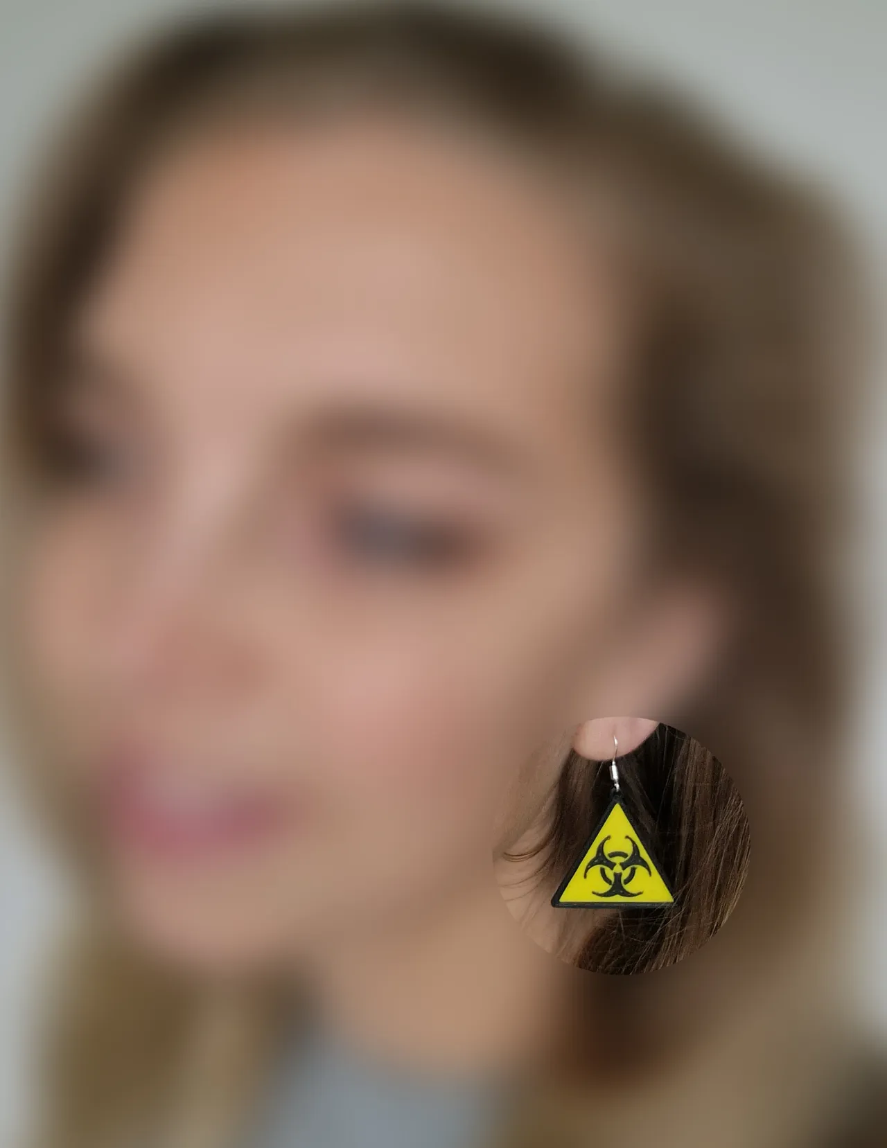 Warning symbol earrings view 2