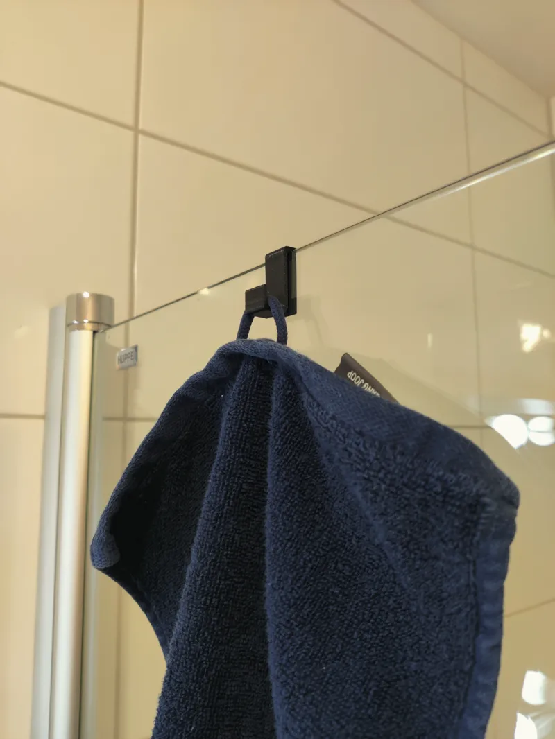 Simple towel hanger for your shower glas door