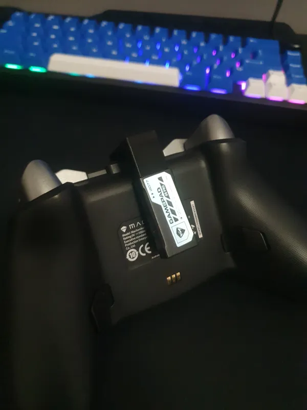 Travel holder for controllet dongle