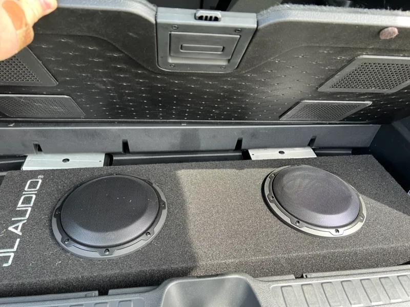 Subwoofer vent for enclosed spaces